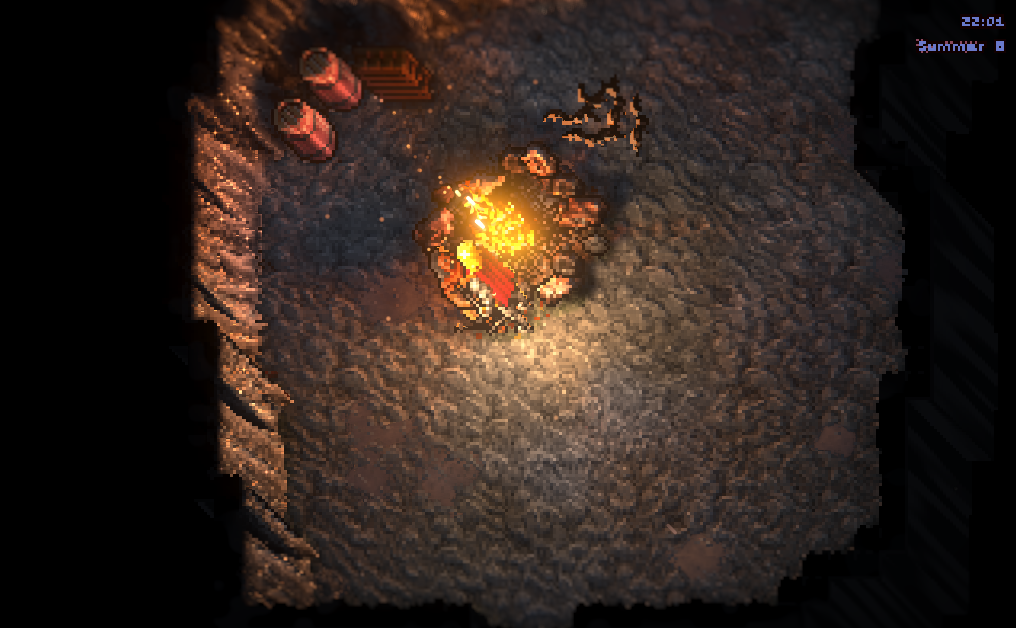 A cave with a campfire, relit